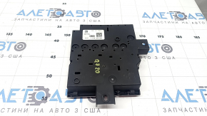 The Audi Q7 20-26 battery distribution plate in the passenger's footwell