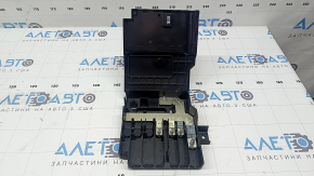 The Audi Q7 20-26 battery distribution plate in the passenger's footwell