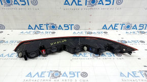 The right rear bumper light of the Audi Q5 80A 21-24 is worn, there is a crack in the glass.