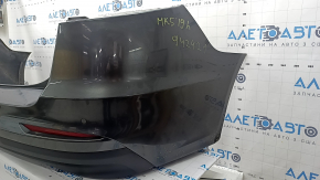 Rear bumper assembly for Ford Fusion mk5 19-20, graphite, with lip, with parking sensors, with reflectors, with wiring, with absorber, dented, scratches, crack, scuffed