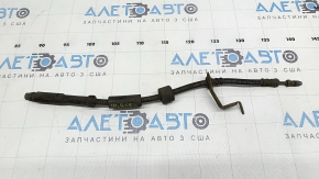 The front right brake hose of a Volvo XC60 18-26 has its edges stripped.