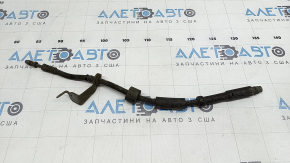 The front right brake hose of a Volvo XC60 18-26 has its edges stripped.
