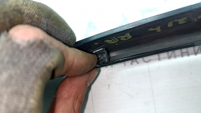 Right rear bumper trim for Toyota Sienna 21-26, glossy black, scratches