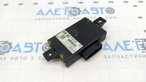 The latch on the Audi A6 C7 12-18 Interface Control Module Unit is broken.