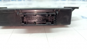The latch on the Audi A6 C7 12-18 Interface Control Module Unit is broken.