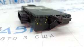 The latch on the Audi A6 C7 12-18 Interface Control Module Unit is broken.