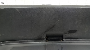 The trunk opening trim for a Toyota Avalon 13-18 is black, worn, the fastener is broken, the plastic has turned white.