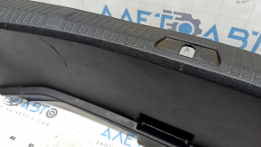 The trunk opening trim for a Toyota Avalon 13-18 is black, worn, the fastener is broken, the plastic has turned white.