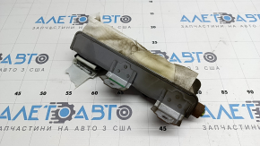 The rear right seat airbag of a Toyota Avalon 13-15 has a rusty squib and is covered in soot.