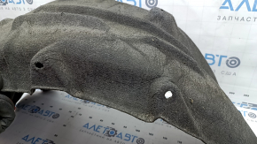 The rear right fender liner of Toyota Sienna 21-26 is dented.