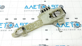 The front left door handle mechanism of a Kia K5 21-26 has a broken mount.