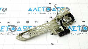 The front left door handle mechanism of a Kia K5 21-26 has a broken mount.