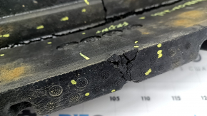 The front bumper absorber for a Toyota Avalon 2013-2014 is cracked and pinched.