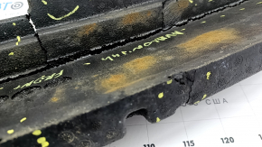 The front bumper absorber for a Toyota Avalon 2013-2014 is cracked and pinched.