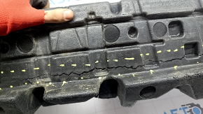 The front bumper absorber for a Toyota Avalon 2013-2014 is cracked and pinched.