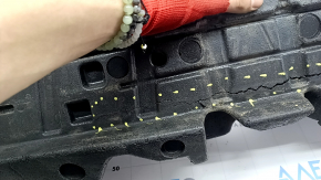 The front bumper absorber for a Toyota Avalon 2013-2014 is cracked and pinched.
