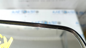 The interior mirror of the Kia K5 21-24 is black and empty, with amalgam peeling off.