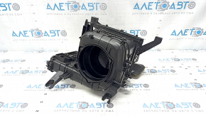 The bare heater housing of a Kia K5 21-24 without a fan or actuator.