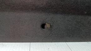 Kia K5 21-24 hood insulation has tears and wear.