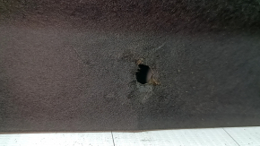 Kia K5 21-24 hood insulation has tears and wear.