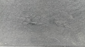Kia K5 21-24 hood insulation has tears and wear.