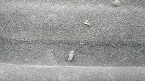 Kia K5 21-26 trunk floor is black, has tears, needs cleaning