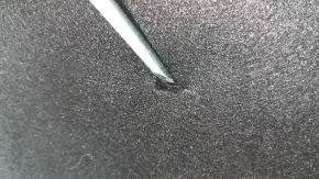 Kia K5 21-24 trunk lid trim is black and has tears.