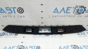 The VW Tiguan 09-13 trunk door number plate light strip is worn out.