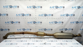 The exhaust pipe with the catalytic converter of the Toyota Avalon 13-17 2.5 hybrid is dented.