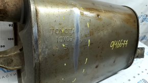 The rear muffler of the Toyota Avalon 13-18 2.5 hybrid is dented.
