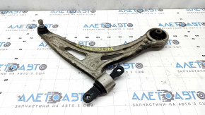 The lower front right control arm of a Kia K5 21-26 has a torn silent block.