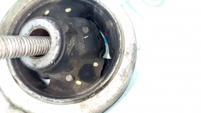 The lower front right control arm of a Kia K5 21-26 has a torn silent block.