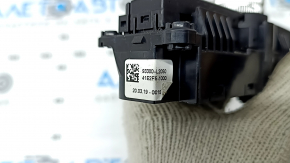 The DRIVE MODE button on the center console of the Kia K5 21-24