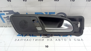 Inside rear right door handle for a VW Tiguan 09-17 with a Dynaudio tweeter, the speaker mesh is cracked.