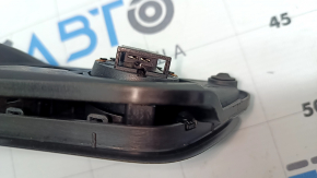 Inside rear right door handle for a VW Tiguan 09-17 with a Dynaudio tweeter, the speaker mesh is cracked.