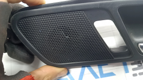 Inside rear right door handle for a VW Tiguan 09-17 with a Dynaudio tweeter, the speaker mesh is cracked.