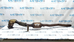 The exhaust pipe with catalytic converters on a VW Tiguan 09-18 has a torn mesh.