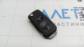VW Tiguan 12-16 key, 4 buttons, folding, scratched