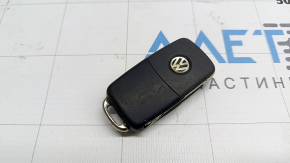 VW Tiguan 12-16 key, 4 buttons, folding, scratched