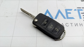 VW Tiguan 12-16 key, 4 buttons, folding, scratched