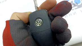 VW Tiguan 12-16 key, 4 buttons, folding, scratched