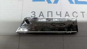Dynadio emblem for the rear right door trim (card) of the VW Tiguan 12-17