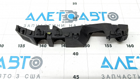 The front bumper mount on the right fender of a Kia Niro 23-26 is broken.