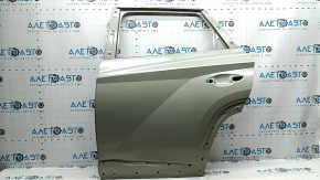 The bare rear left door of a Hyundai Tucson 22-24