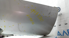 The bare lower rear bumper of a Volvo XC90 16-26 for parking sensors, without one parking sensor mount, white, scratches