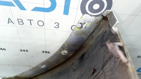 The bare lower rear bumper of a Volvo XC90 16-26 for parking sensors, without one parking sensor mount, white, scratches