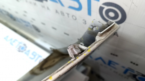 The bare lower rear bumper of a Volvo XC90 16-26 for parking sensors, without one parking sensor mount, white, scratches