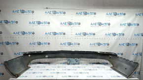 The bare lower rear bumper of a Volvo XC90 16-26 for parking sensors, without one parking sensor mount, white, scratches