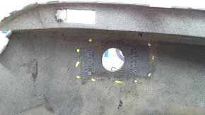 The bare lower rear bumper of a Volvo XC90 16-26 for parking sensors, without one parking sensor mount, white, scratches