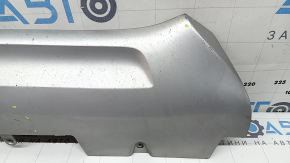 The front bumper lip of the Volvo XC90 16-19 is worn and scratched.